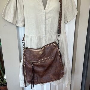 Boho Western whipstitched vegan leather crossbody with 3 exterior zippers